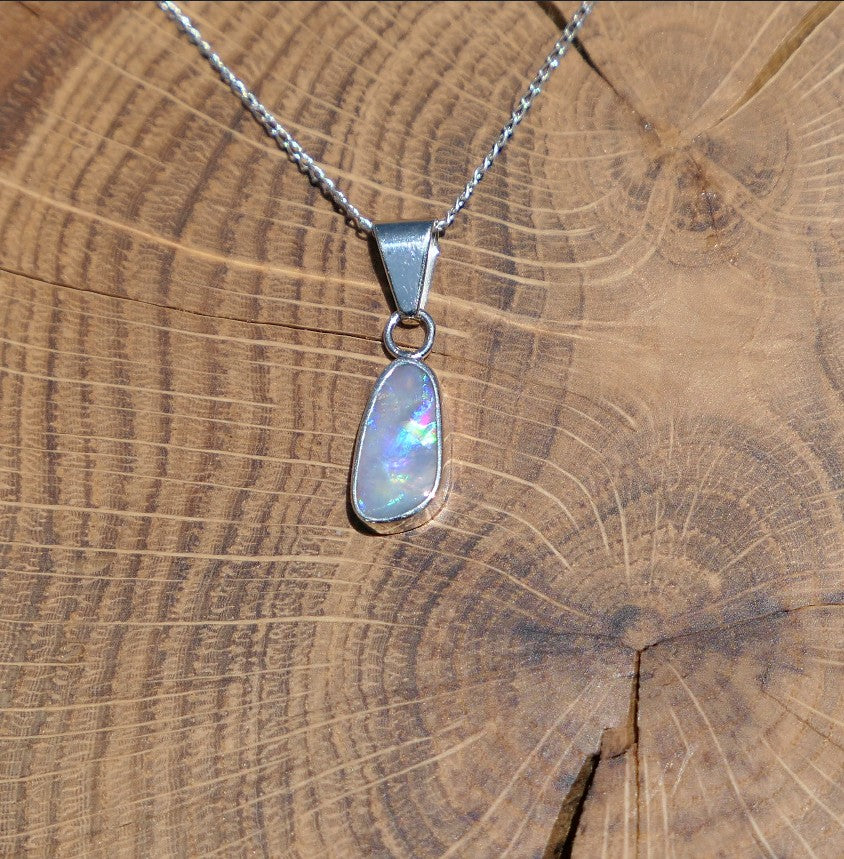 Silver opal pendant with a Mintabie solid opal
