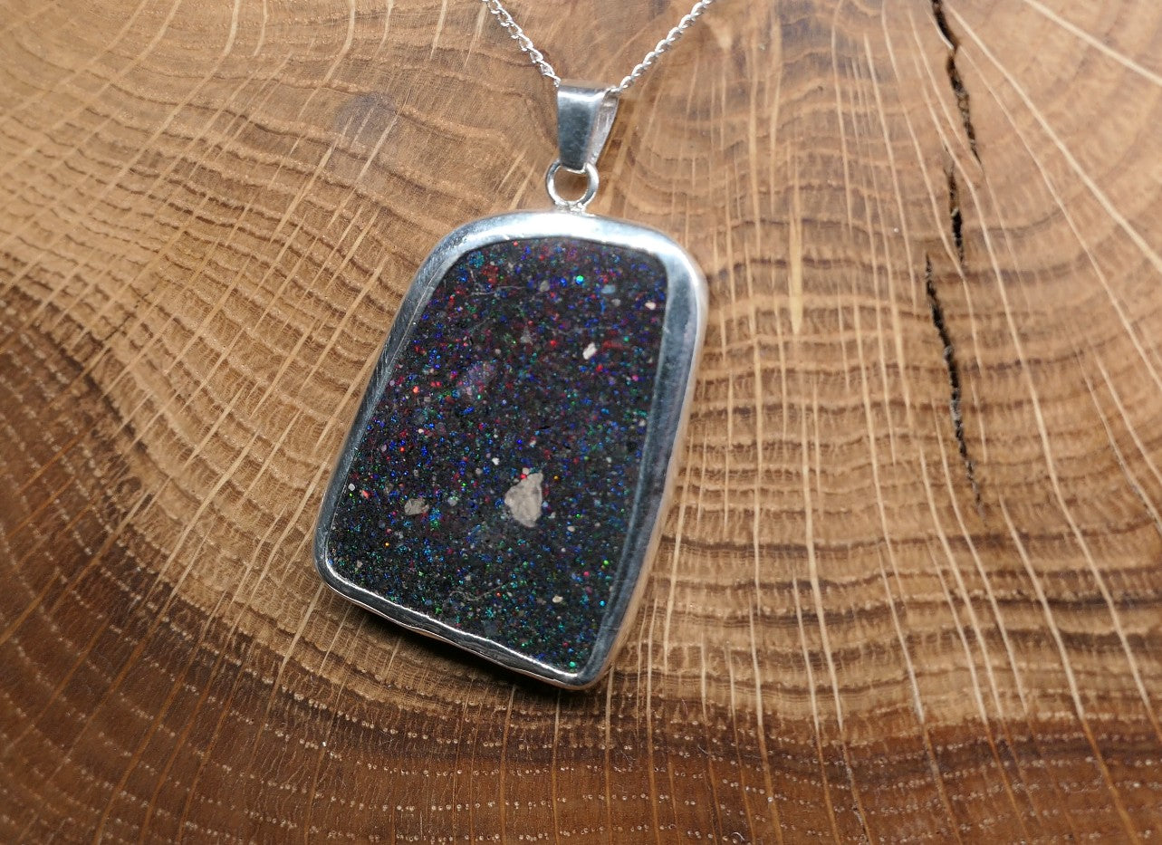 Double sided silver pendant with a Honduran matrix opal