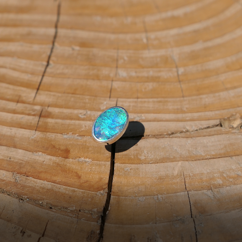 Silver tie tack with Coober Pedy opal.