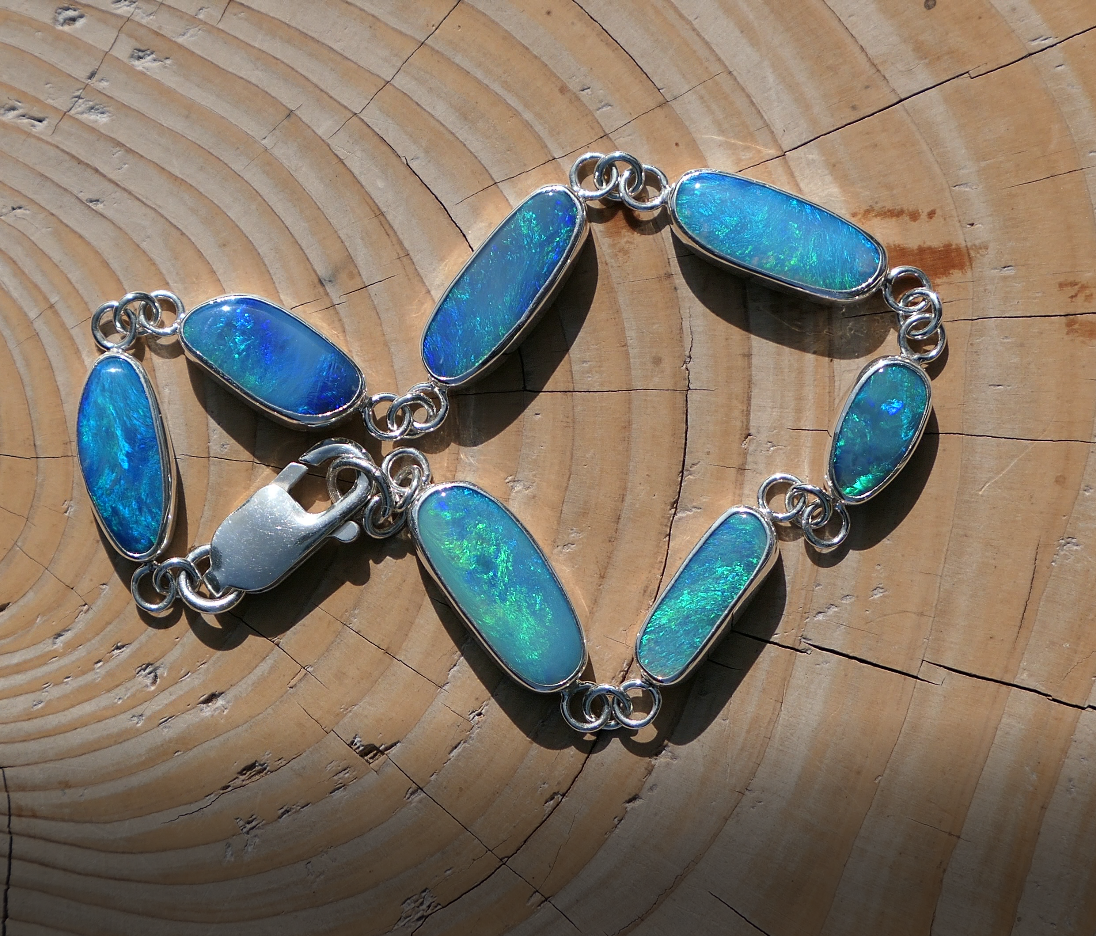 Silver opal bracelet, beautiful bright greens and blue opals