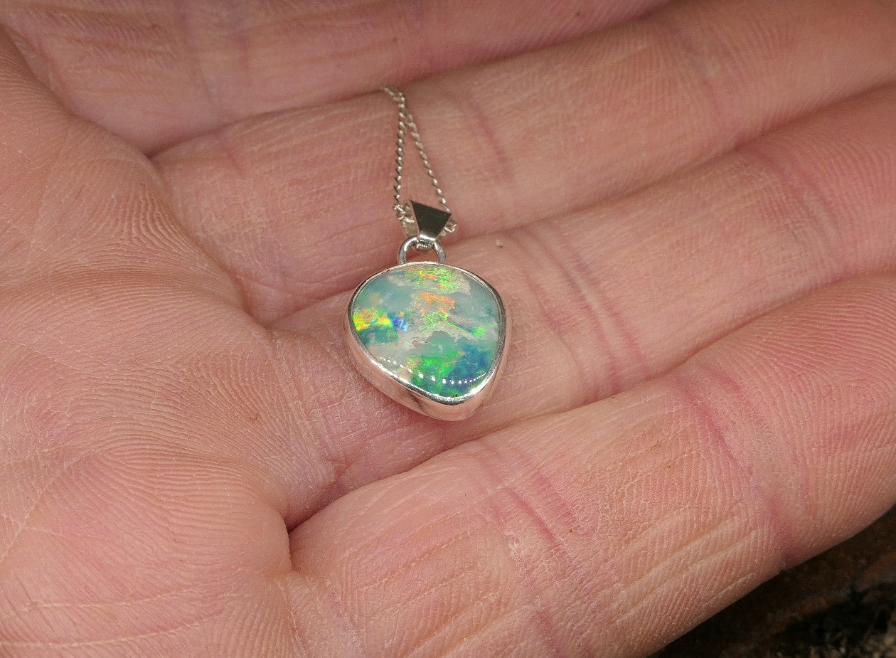 Opalised shell pendant