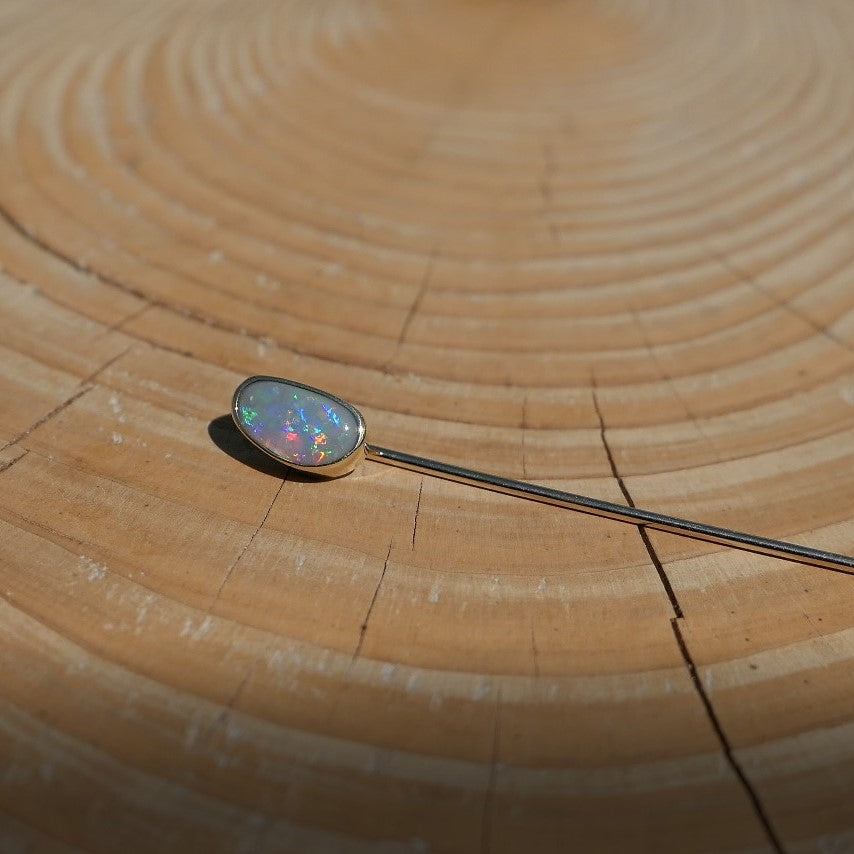 Lightning Ridge opal tie pin, opal is 0.75ct, measures 9x5mm, semi black n6 body tone, 4/5 brightness.