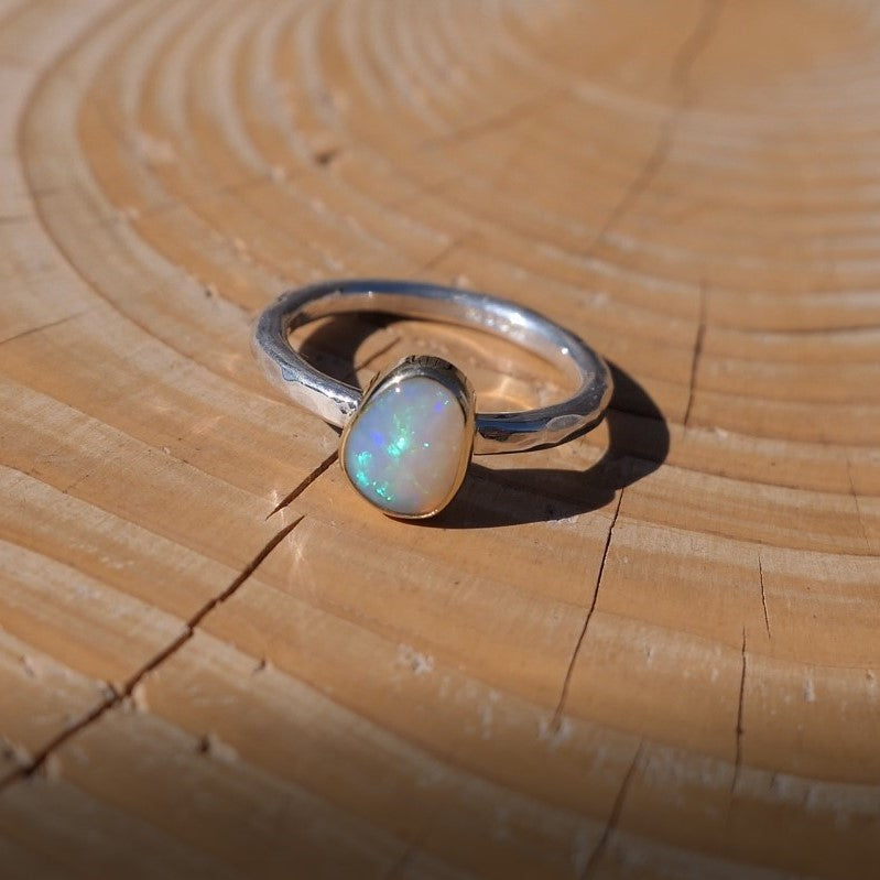 Lightning Ridge crystal opal ring with 18k gold bezel