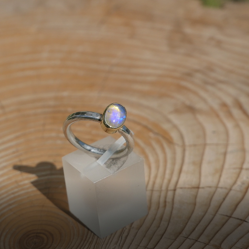 Silver opal ring with 18k gold bezel