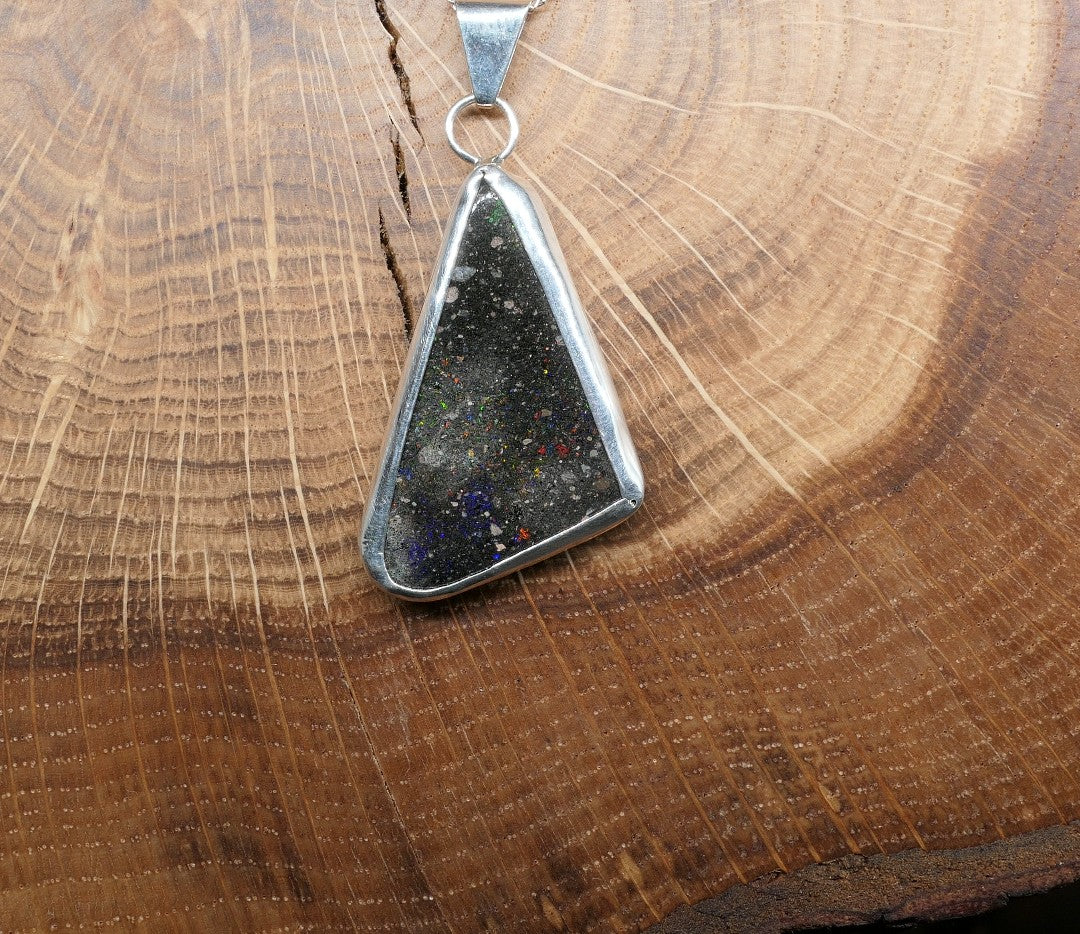 Double sided silver pendant with a Honduran matrix opal