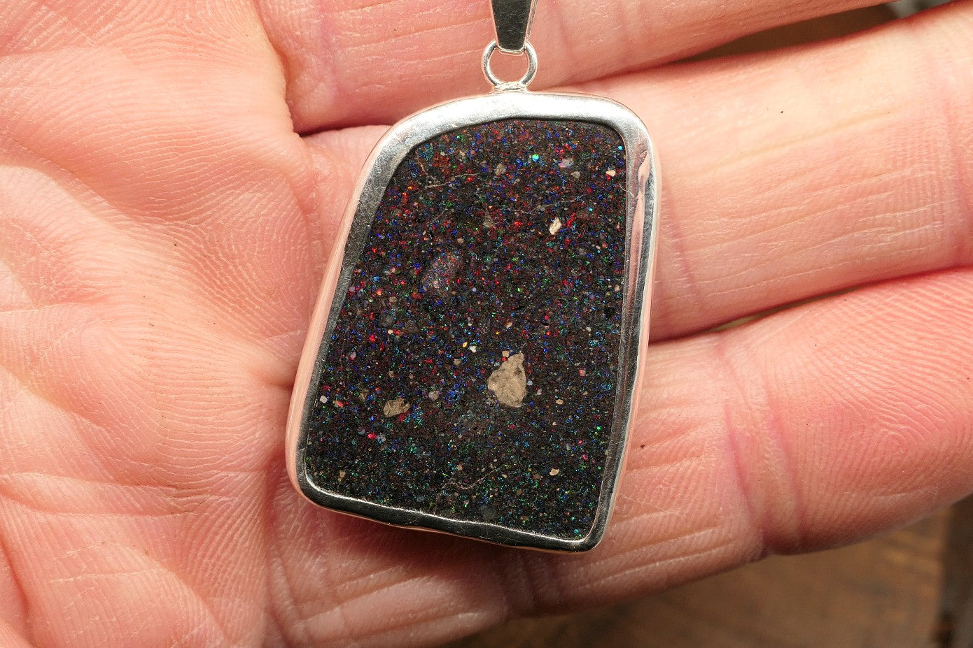 Double sided silver pendant with a Honduran matrix opal