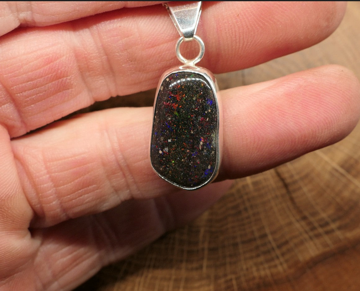 Silver opal pendant with a Honduran matrix opal