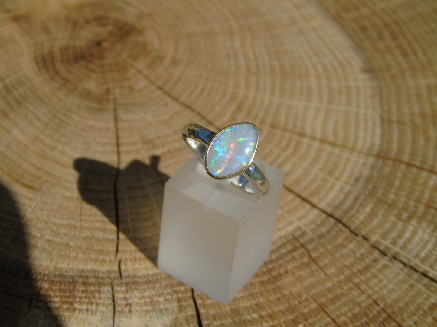 Lightning Ridge opal ring with 18k gold bezel