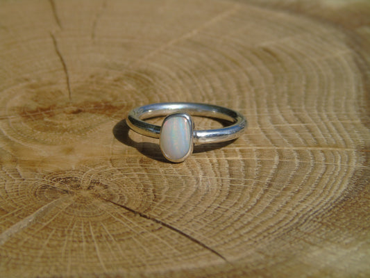 Opal ring, size O