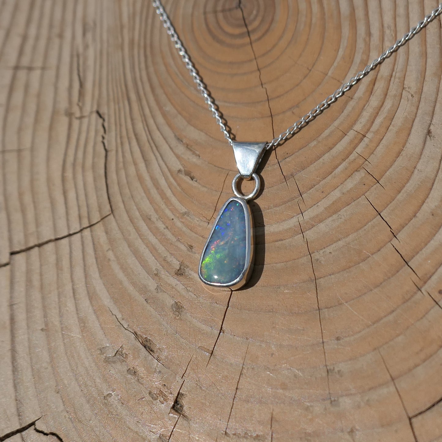 Silver pendant with solid Mintubi opal, approx 1ct, 12x6mm.