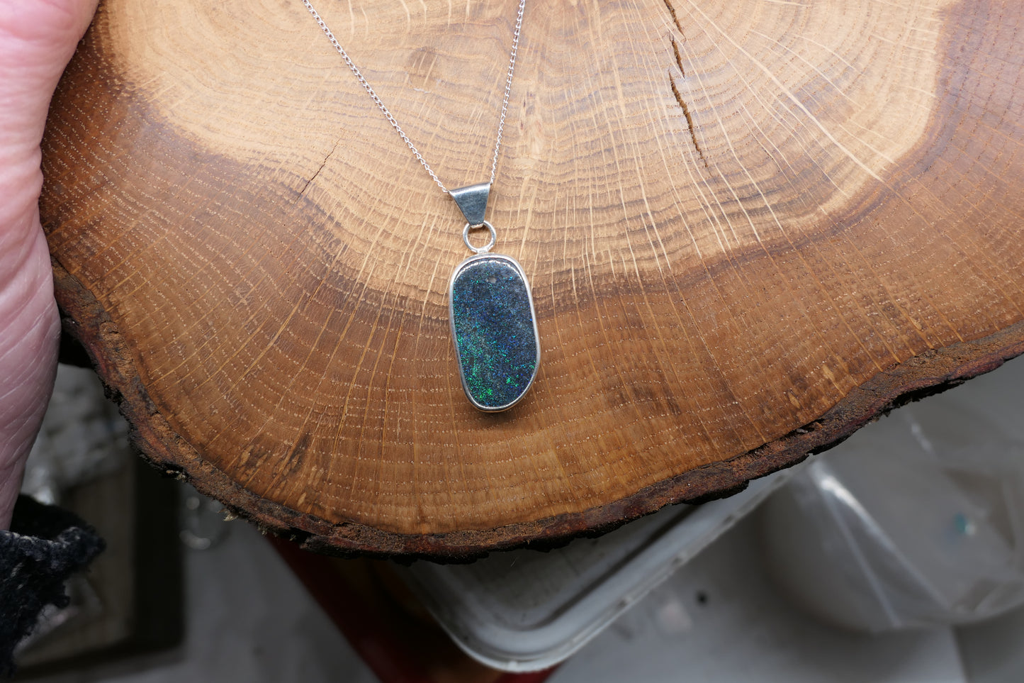 Silver opal pendant with an Andamooka marix opal
