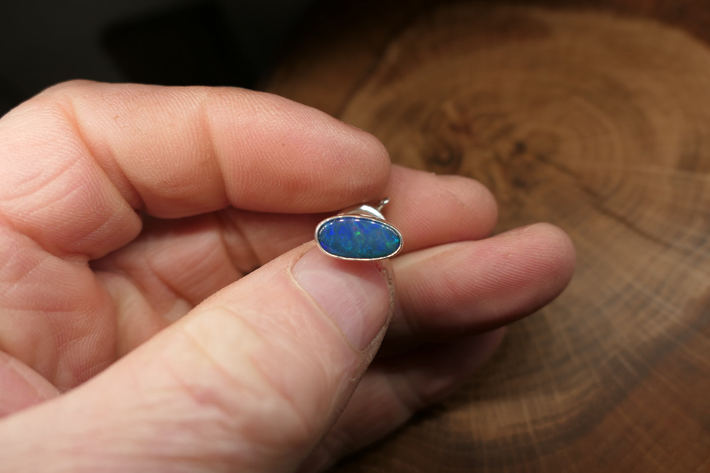 Silver tie tack with an Andamooka doublet opal