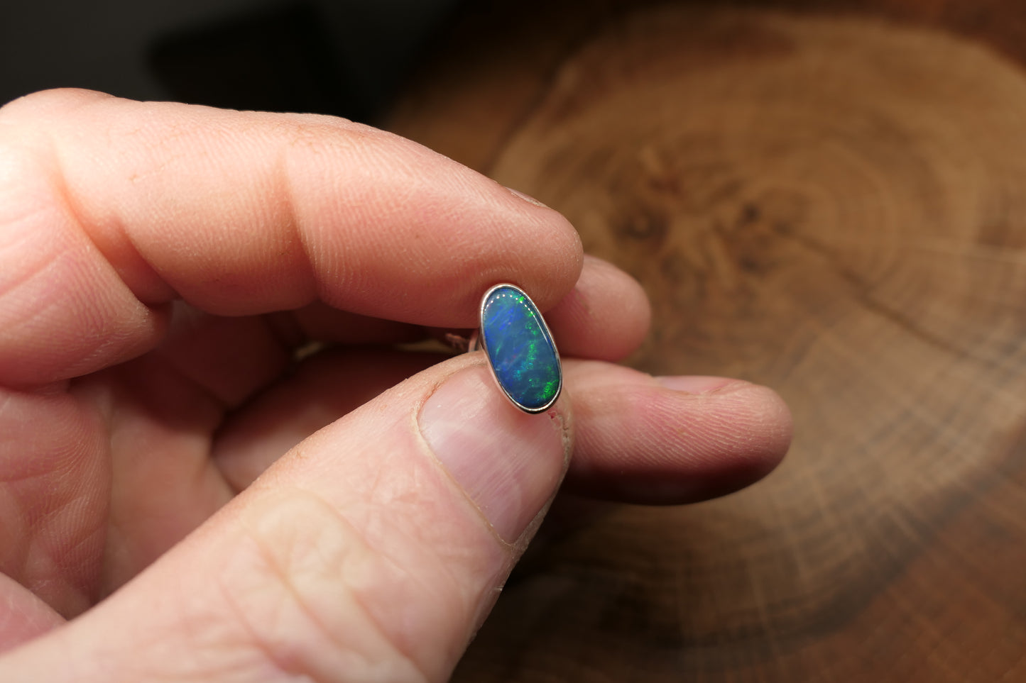 Silver tie tack with an Andamooka doublet opal