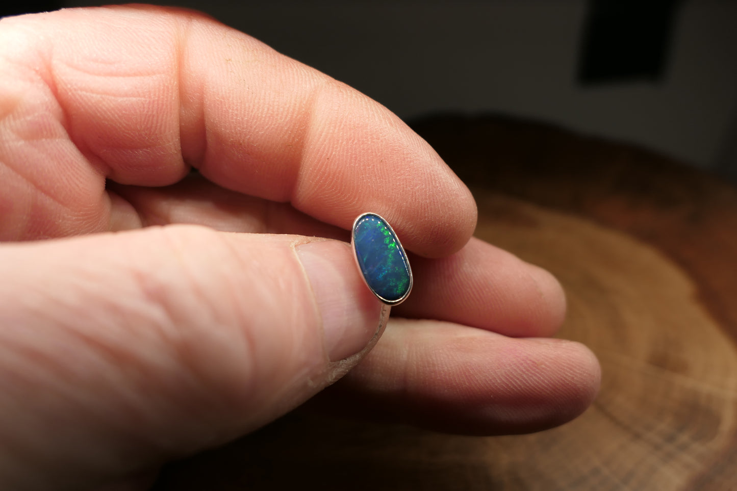 Silver tie tack with an Andamooka doublet opal