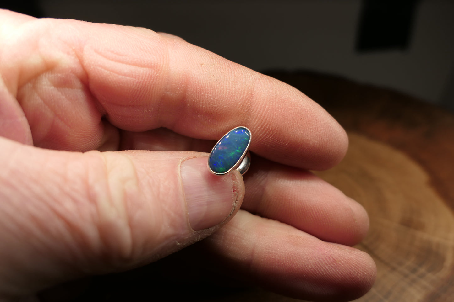 Silver tie tack with an Andamooka doublet opal