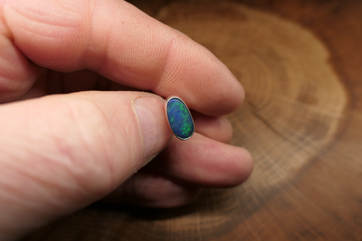 Silver tie tack with an Andamooka doublet opal