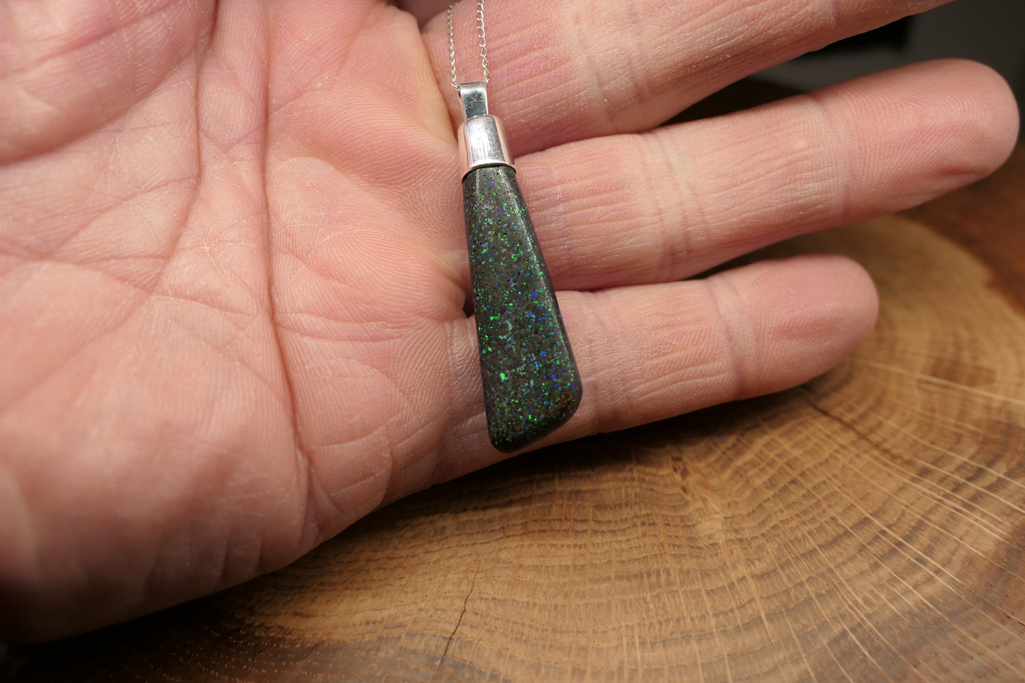 Silver opal pendant with a Queensland matrix opal
