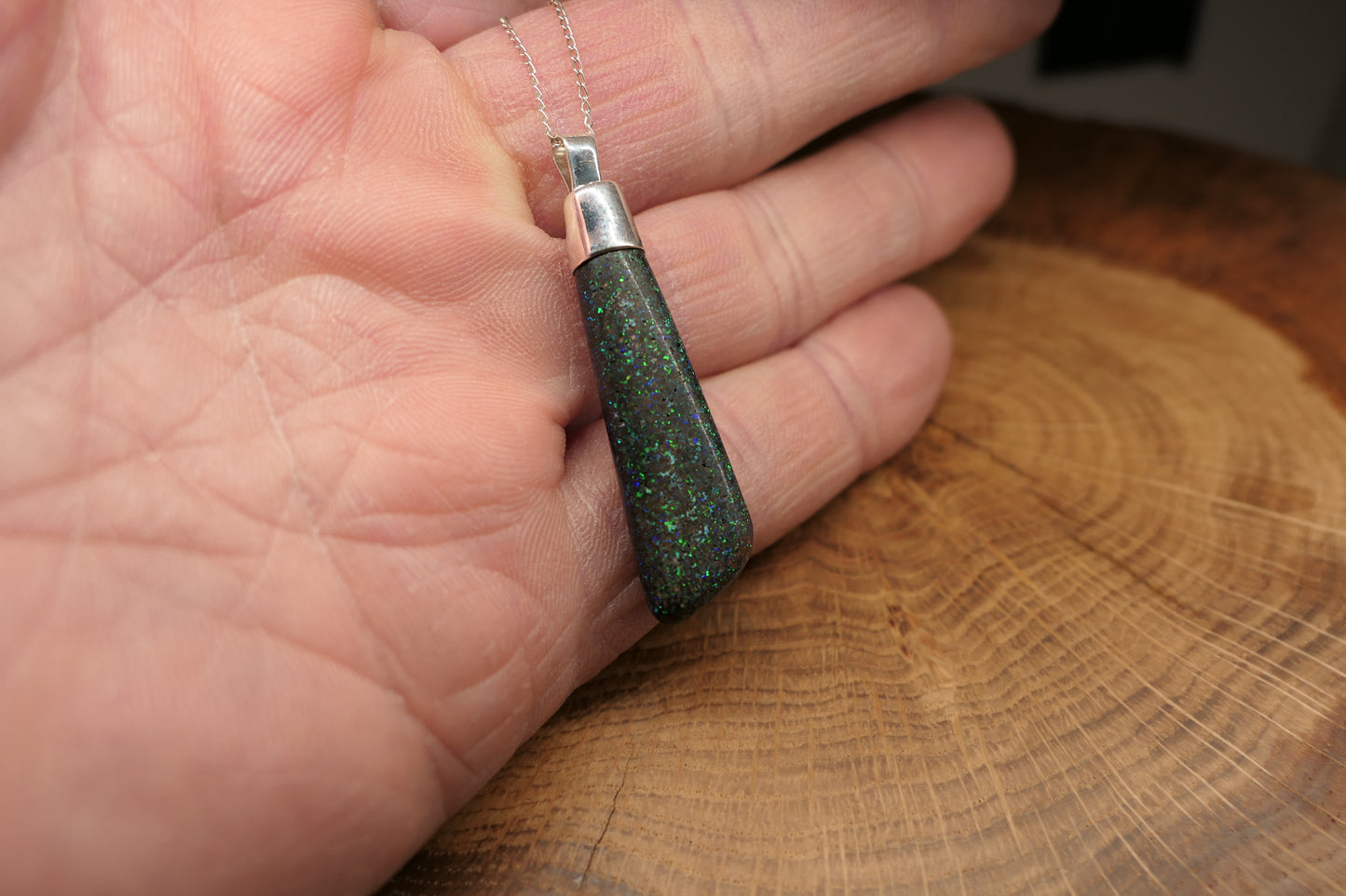Silver opal pendant with a Queensland matrix opal