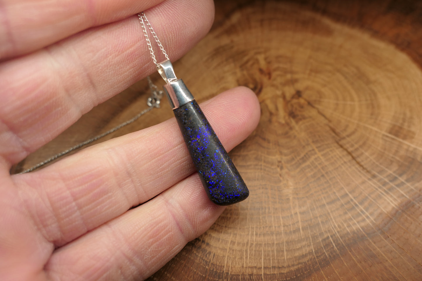Silver opal pendant with a Queensland matrix opal