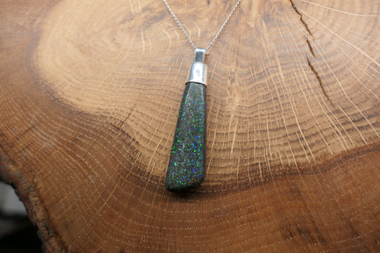 Silver opal pendant with a Queensland matrix opal