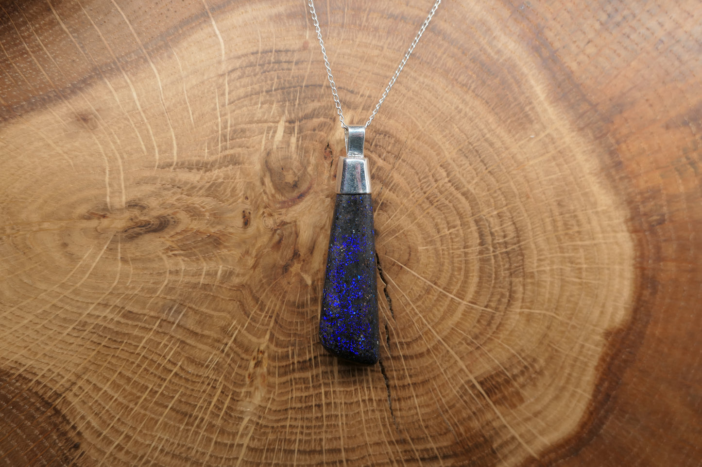 Silver opal pendant with a Queensland matrix opal