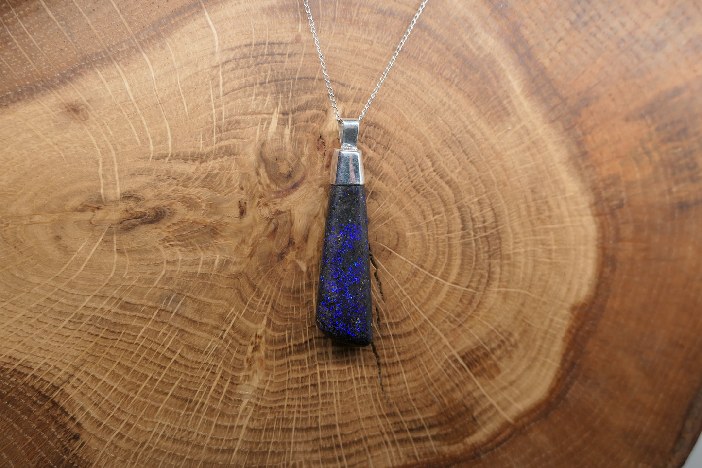 Silver opal pendant with a Queensland matrix opal