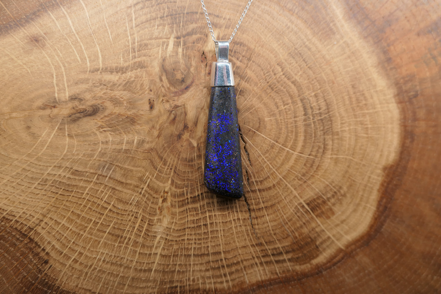 Silver opal pendant with a Queensland matrix opal