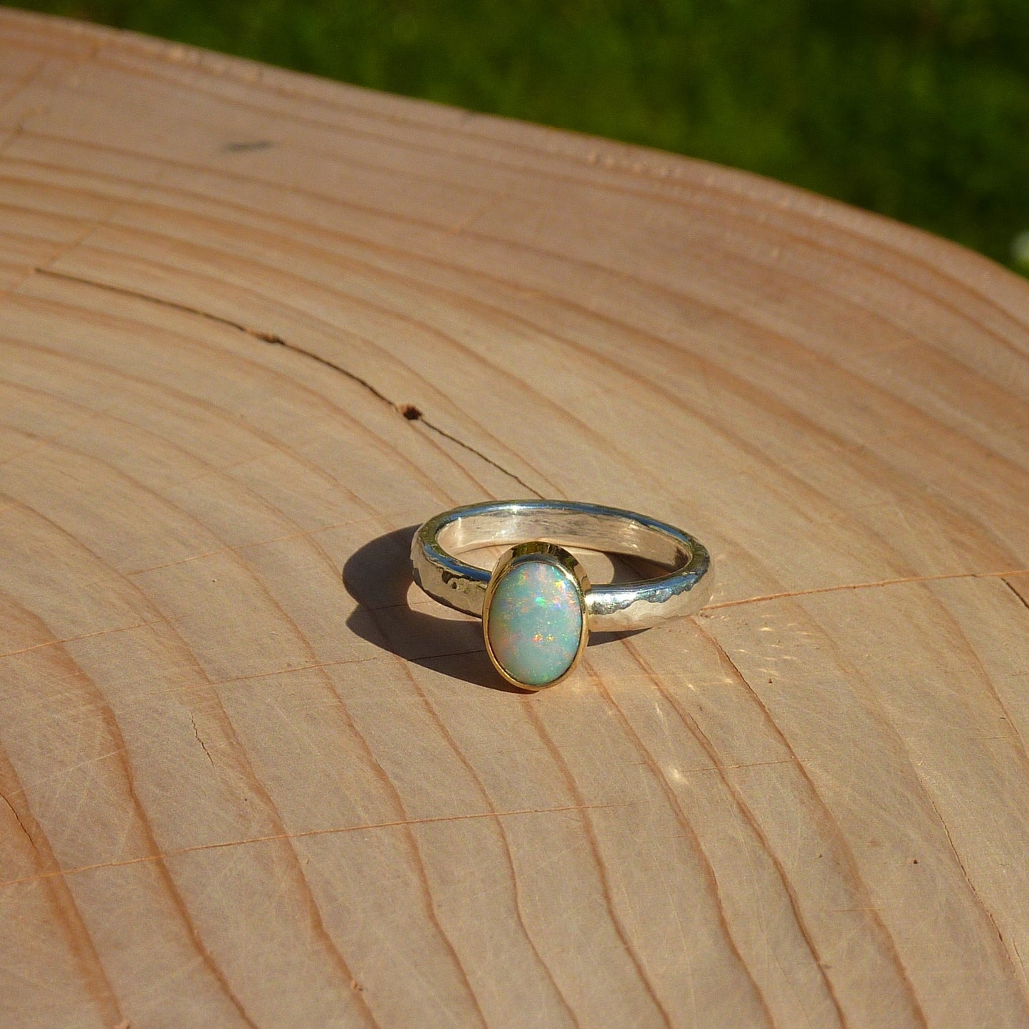 Dainty silver opal ring with 18k gold bezel