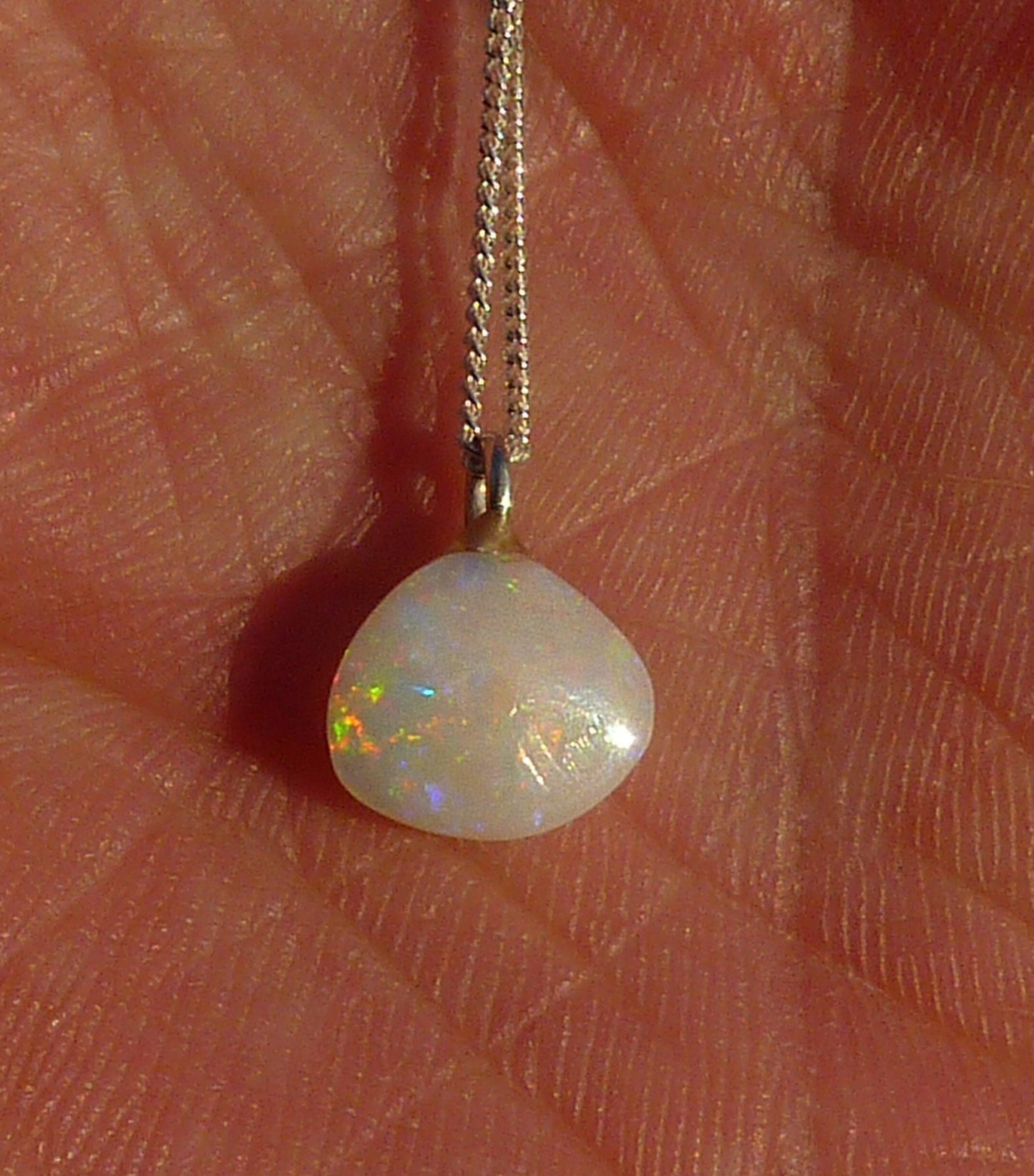 Opalised shell pendant