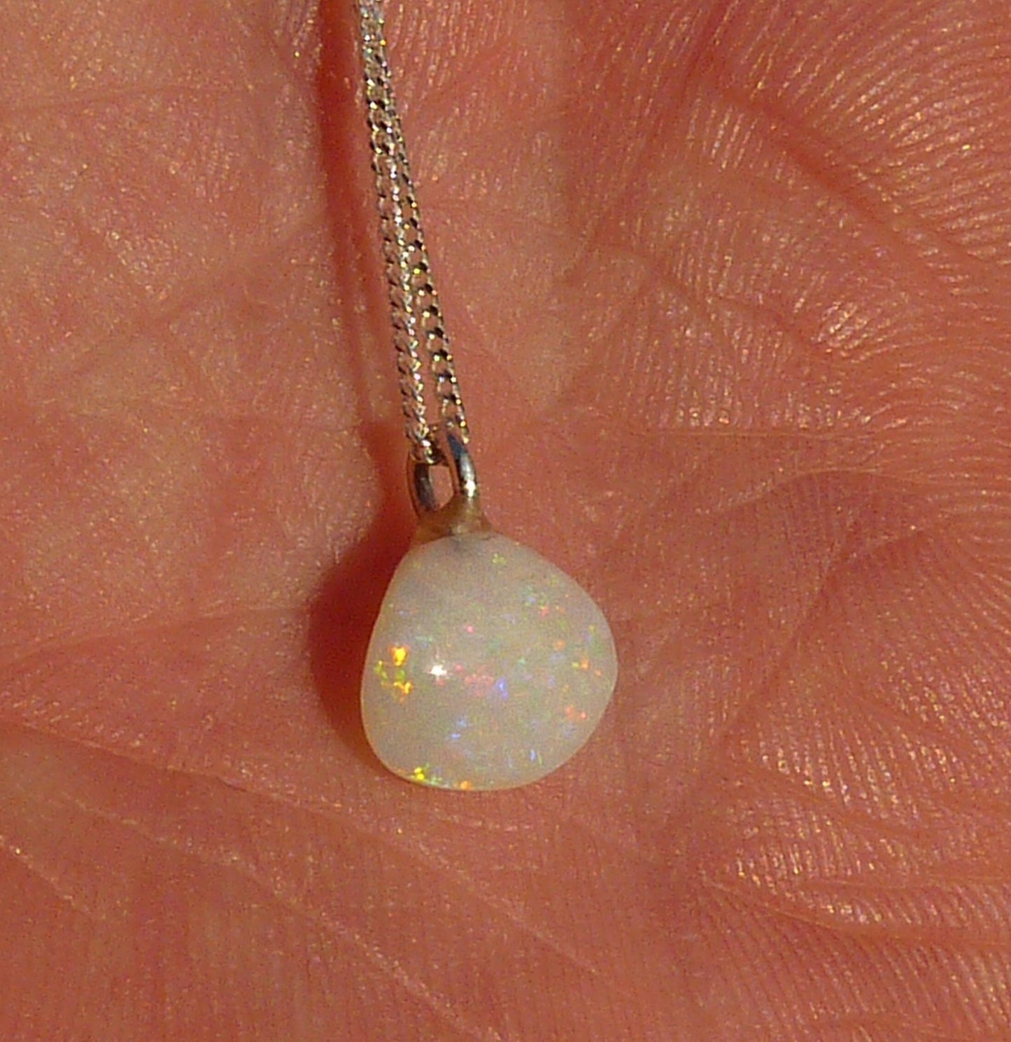 Opalised shell pendant