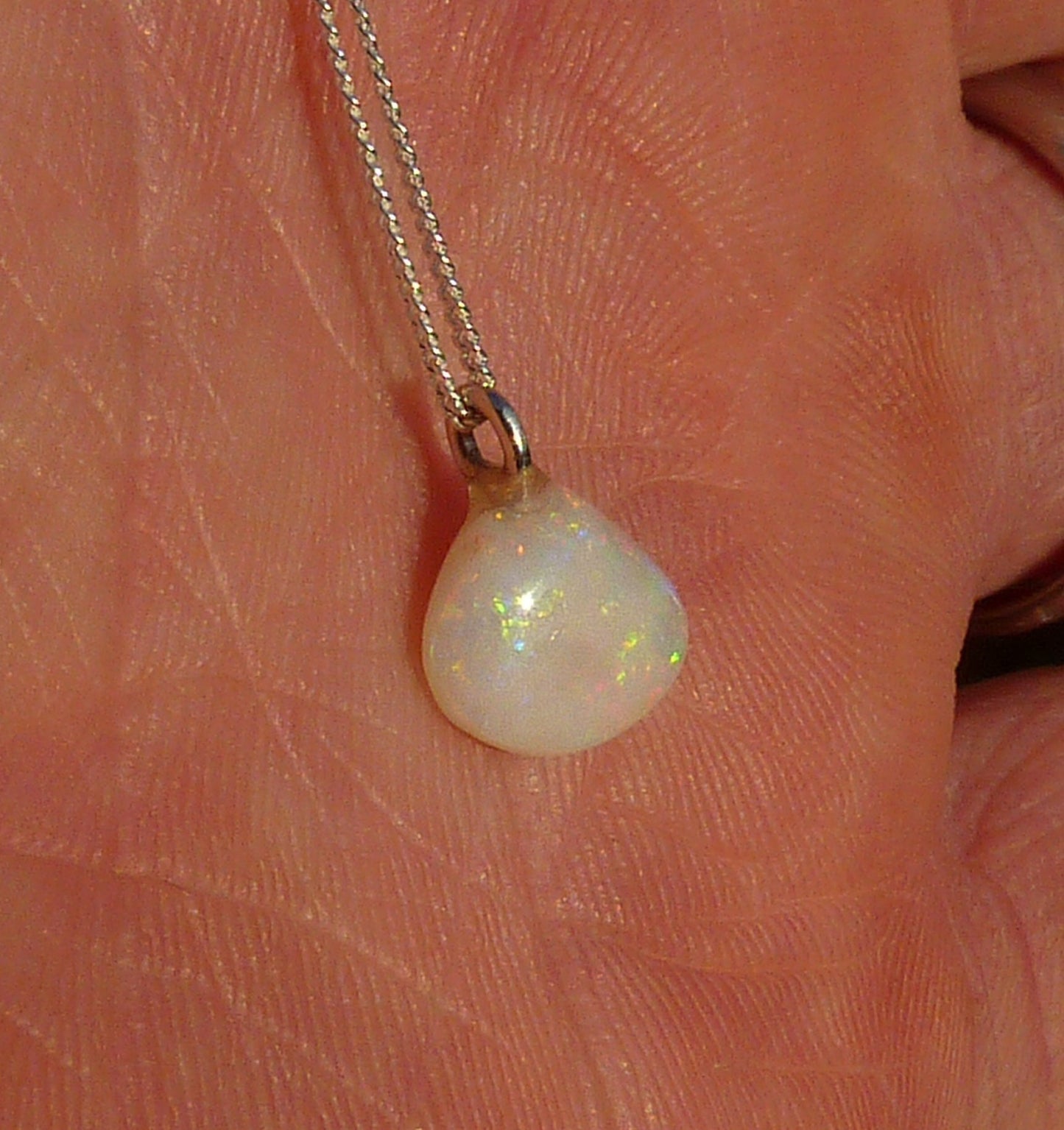 Opalised shell pendant