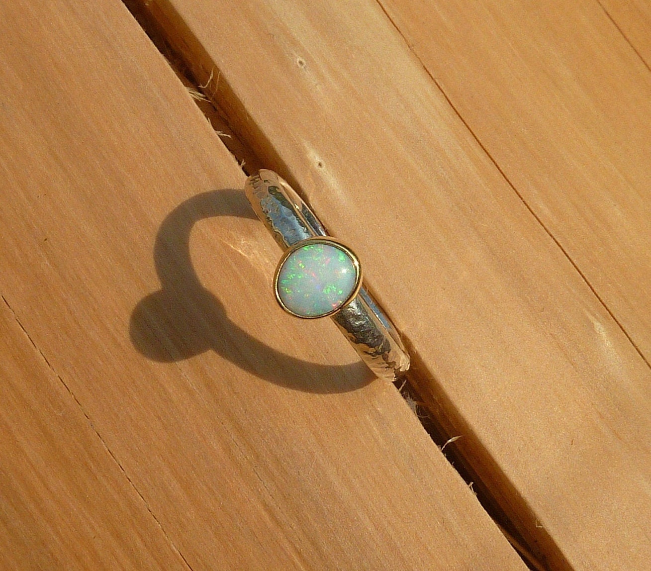 Coober Pedy opal ring with 18k gold bezel