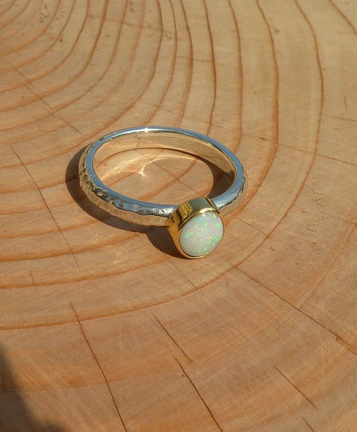 Coober Pedy opal ring with 18k gold bezel