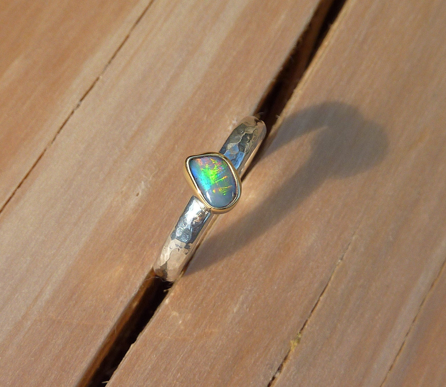 Coober Pedy opal ring with 18k gold bezel