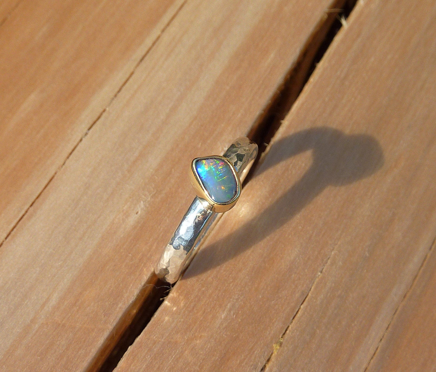 Coober Pedy opal ring with 18k gold bezel