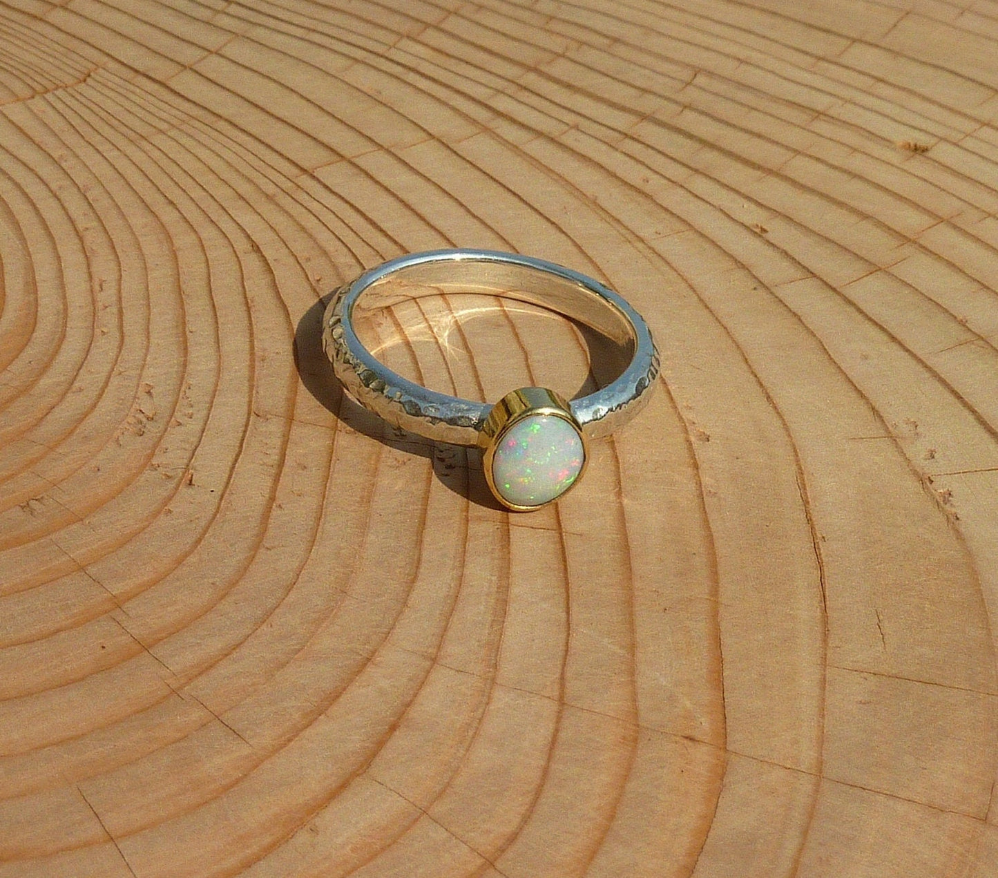 Coober Pedy opal ring with 18k gold bezel