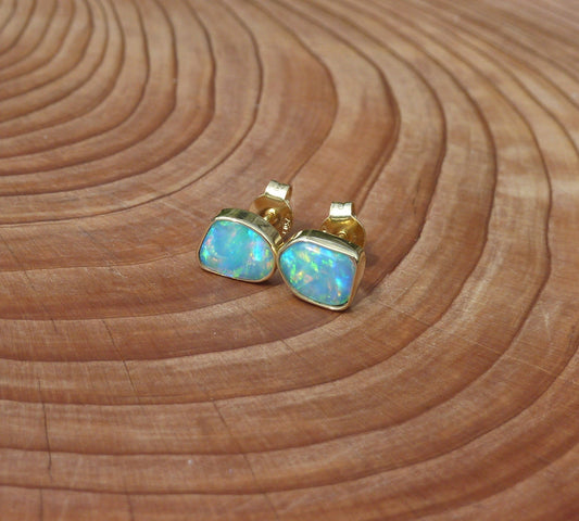 Matching 18k gold opal ear studs