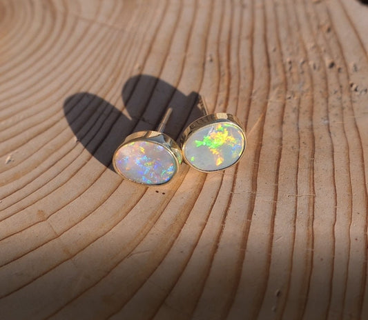 Matching 18k gold opal ear studs