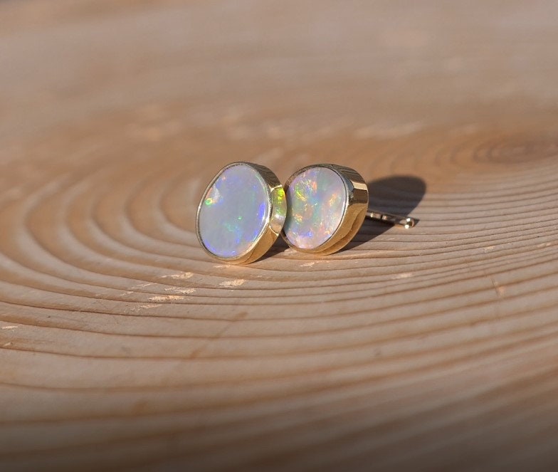 Matching 18k gold opal ear studs