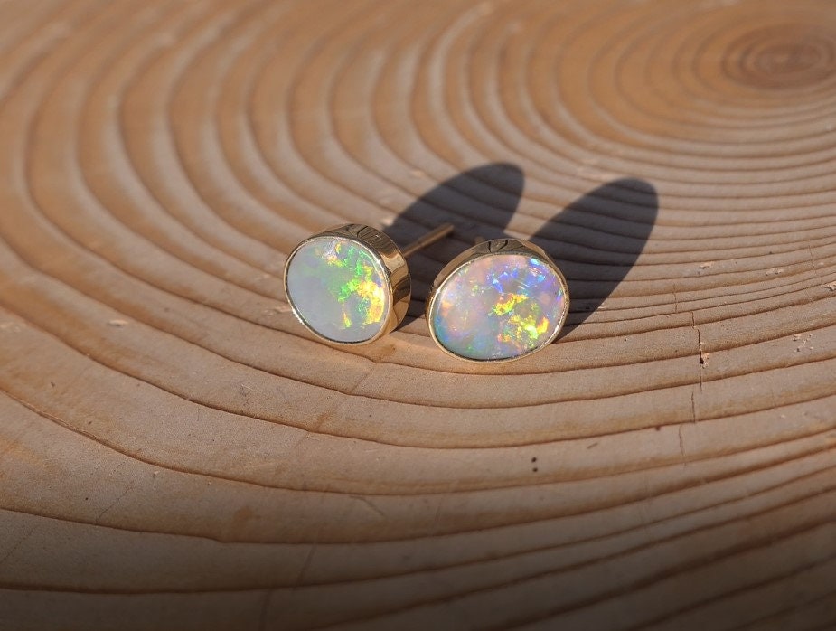 Matching 18k gold opal ear studs