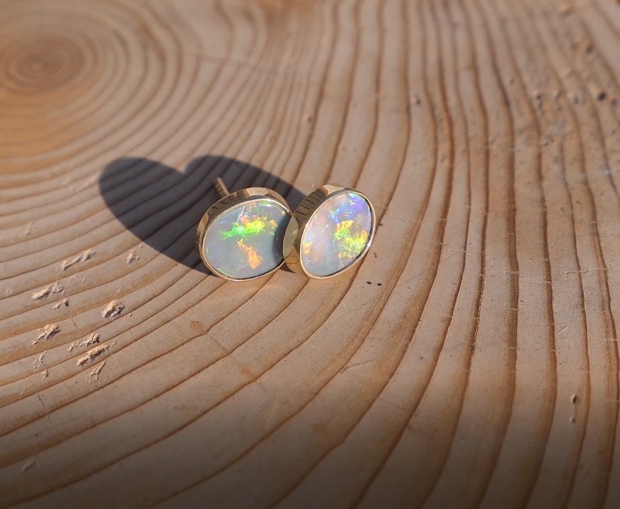 Matching 18k gold opal ear studs